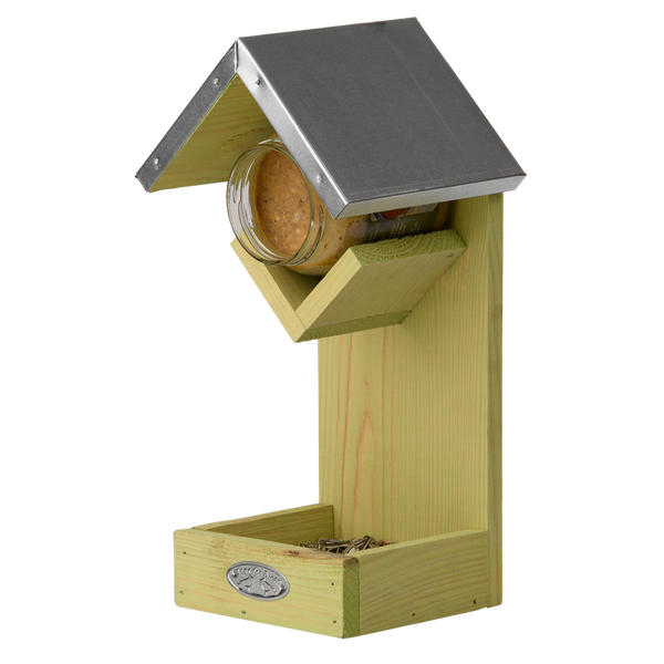 Erdnussbutterhaus mit Futtertisch