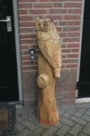 Holzskulptur Eule auf Stamm