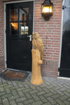 Holzskulptur Eule auf Stamm