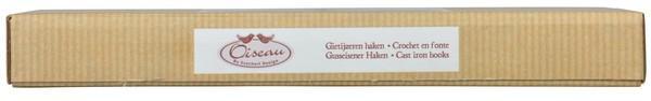Gehäkelte Vögel in einer Reihe in einer Geschenkbox